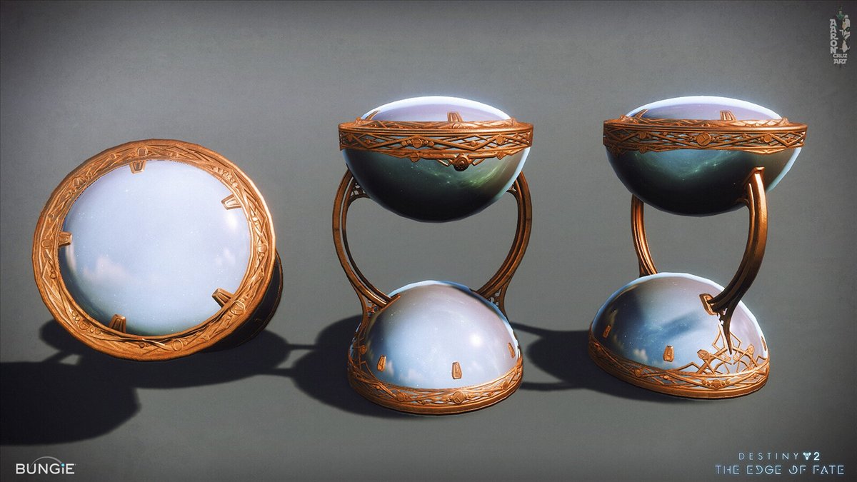 Trois capsules de strangelet : des sabliers de verre bleuté cerclés de cuivre