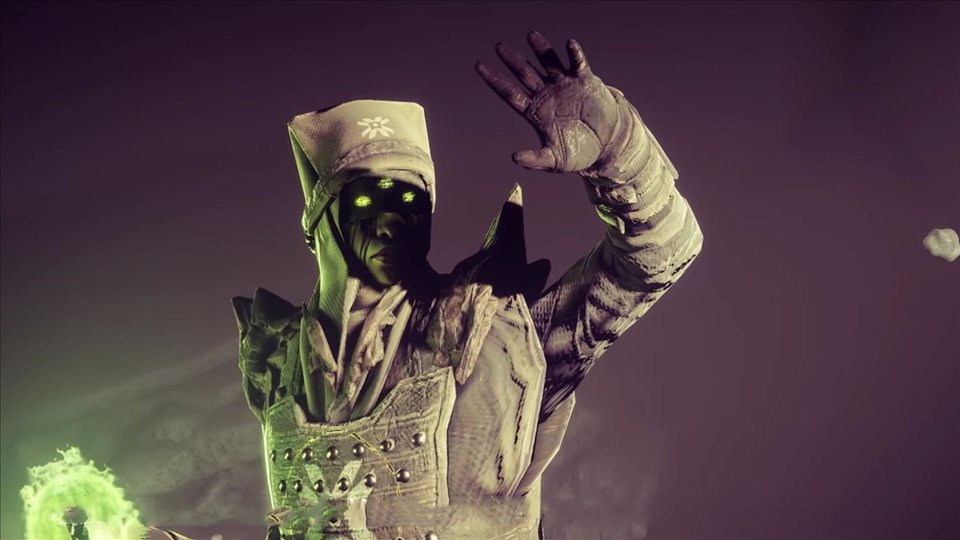 Eris Morn, les yeux bandés d'où filtre une lueur verte, la main levée