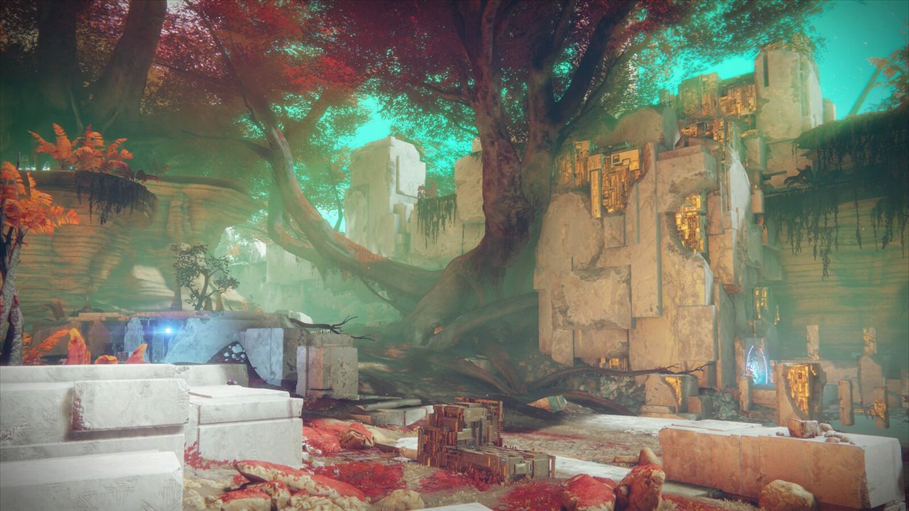 La Tombe de l'Observateur : un arbre rouge géant au milieu de blocs de pierre blanche, sous un ciel turquoise